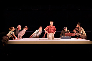 Ed McVey (centre) as Tom Ripley & the cast 
